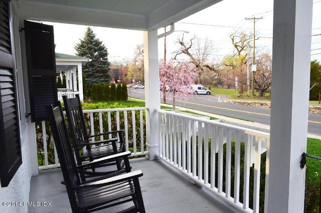 17 Strickland Road Cos Cob, CT 06807 - Photo 4 of 18 a view of a porch with a table and chairs