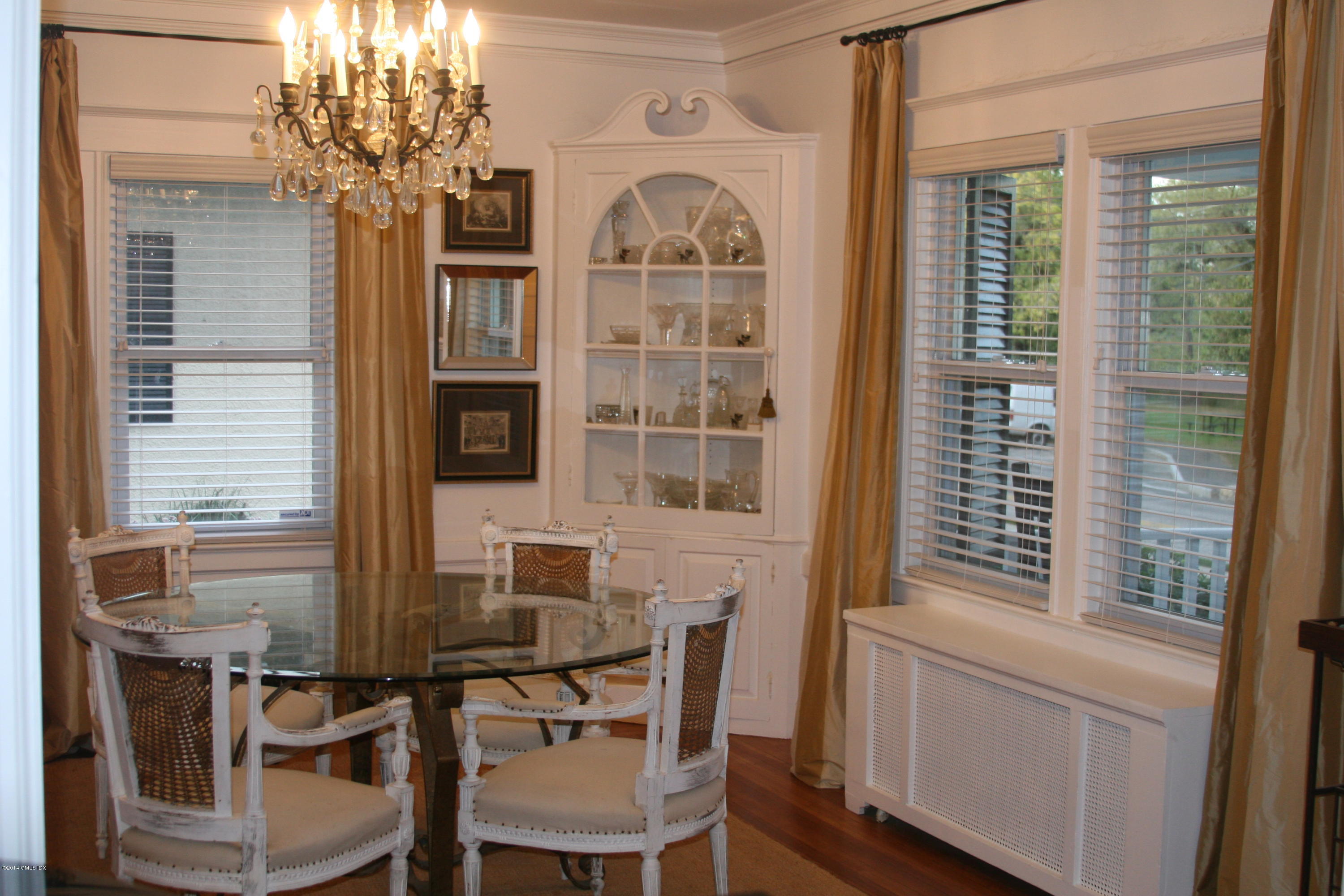17 Strickland Road Cos Cob, CT 06807 - Photo 8 of 18 a view of a dining room with furniture and a window