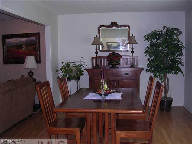 6337 Phillippi Road Julian, NC 27283 - Photo 2 of 16 Dining Room. Formal Dining Room with beautiful wood floors opens to Living Room
