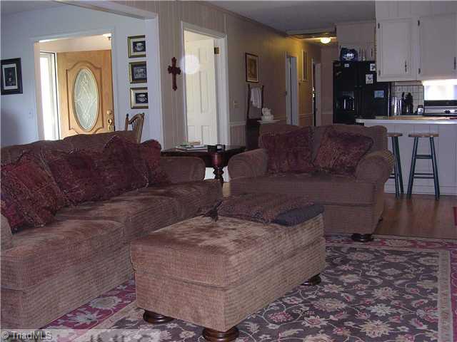 6337 Phillippi Road Julian, NC 27283 - Photo 16 of 16 Living Room. Inviting open floor plan