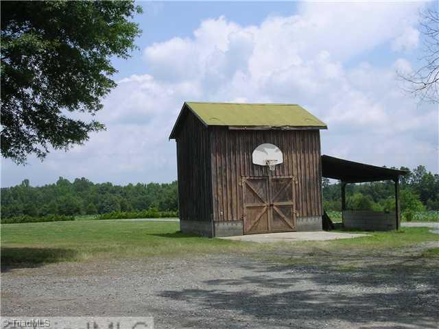 6337 Phillippi Road Julian, NC 27283 - Photo 8 of 16 Storage. One of the two old storage barns