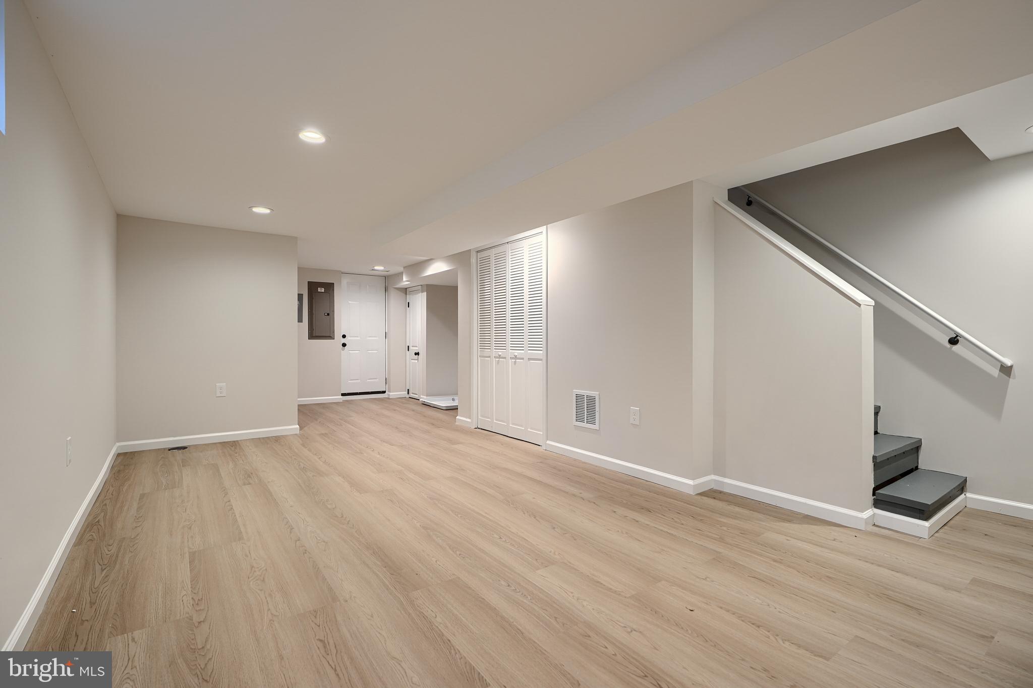 3934 Rokeby Road Baltimore, MD 21229 - Photo 27 of 38 a view of an empty room with wooden floor