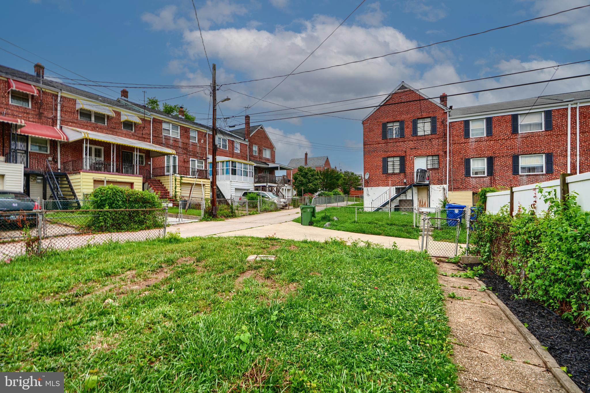 3934 Rokeby Road Baltimore, MD 21229 - Photo 37 of 38 a front view of a building with garden