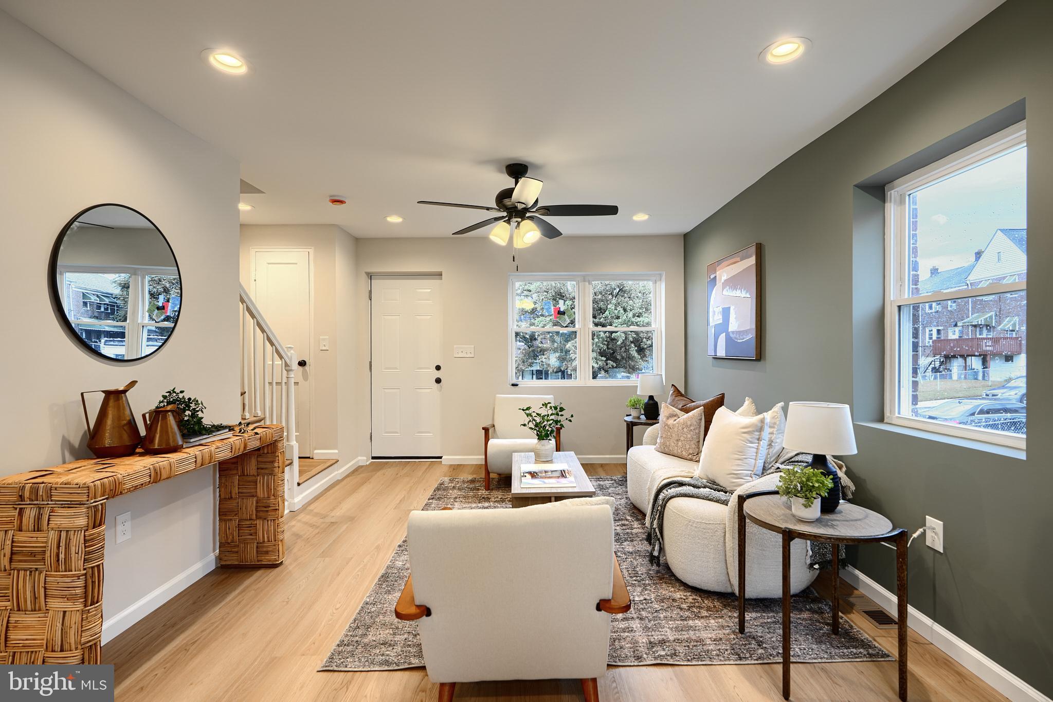 3934 Rokeby Road Baltimore, MD 21229 - Photo 5 of 38 a living room with furniture a rug and a window