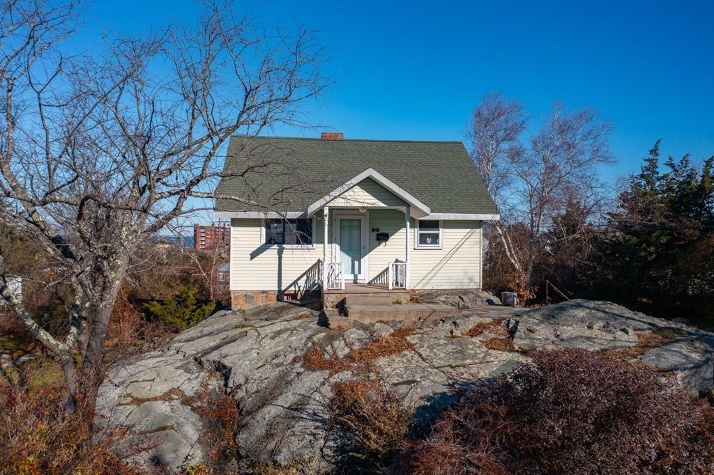 50 Wyola Road Hull, MA 02045 - Photo 15 of 28 a view of a house with a yard
