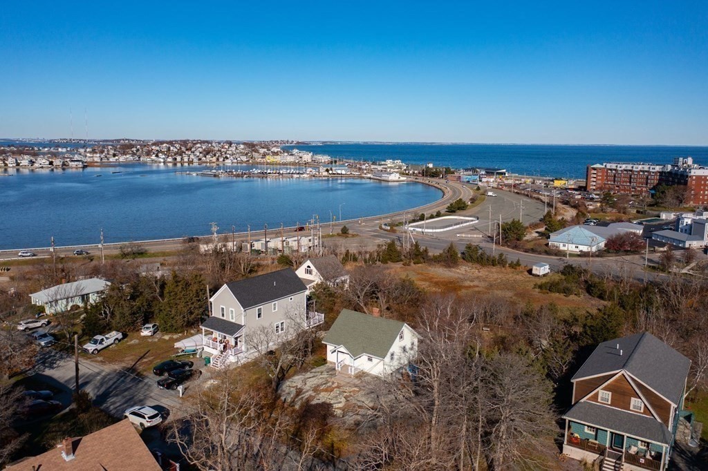 50 Wyola Road Hull, MA 02045 - Photo 5 of 28 an aerial view of a house with a ocean view
