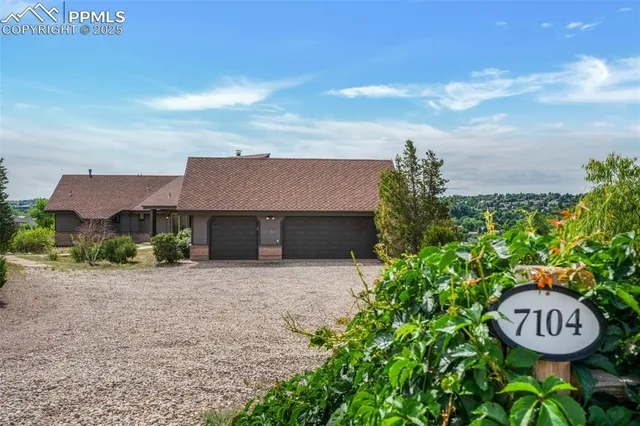 a view of a house with a garden