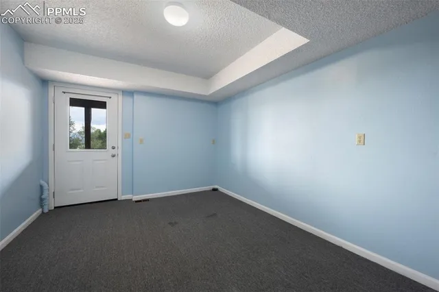 an empty room with a empty space and window