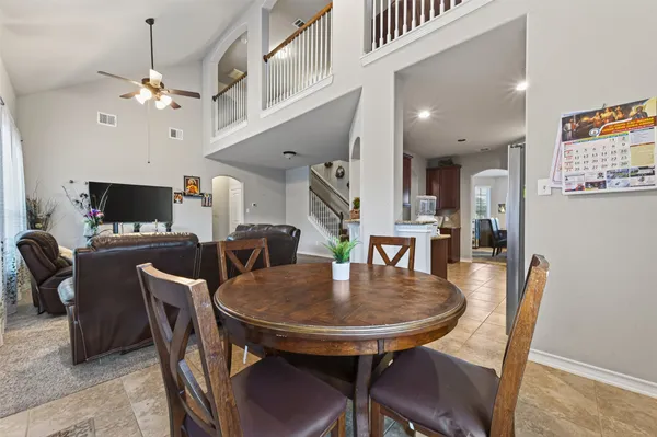 a view of a dining room with furniture