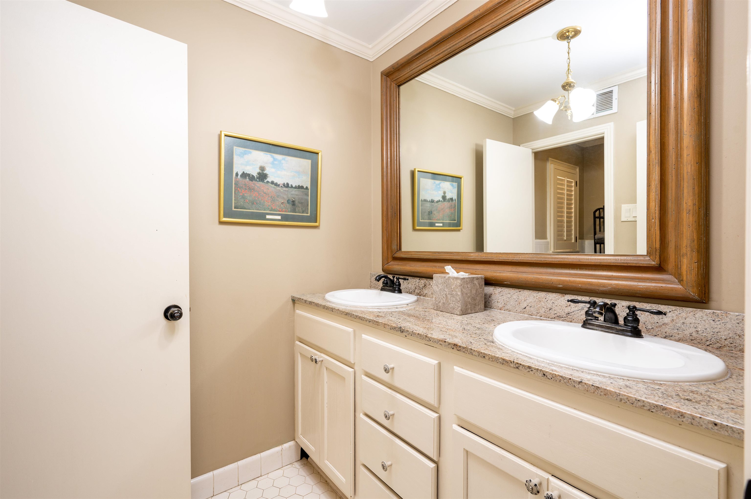 1187 Hayne Road Memphis, TN 38119 - Photo 17 of 25 a bathroom with a granite countertop sink mirror and a