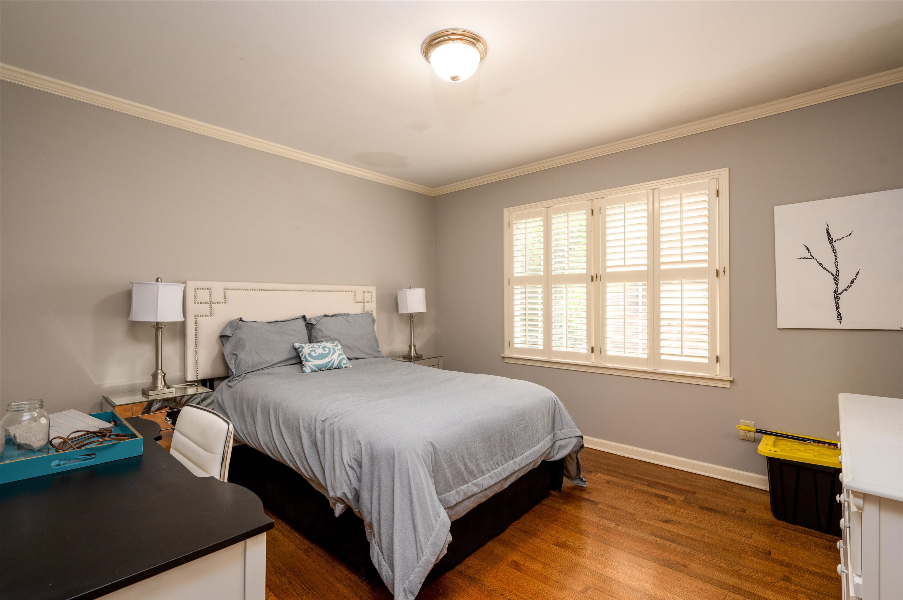1187 Hayne Road Memphis, TN 38119 - Photo 18 of 25 a bedroom with a bed and wooden floor