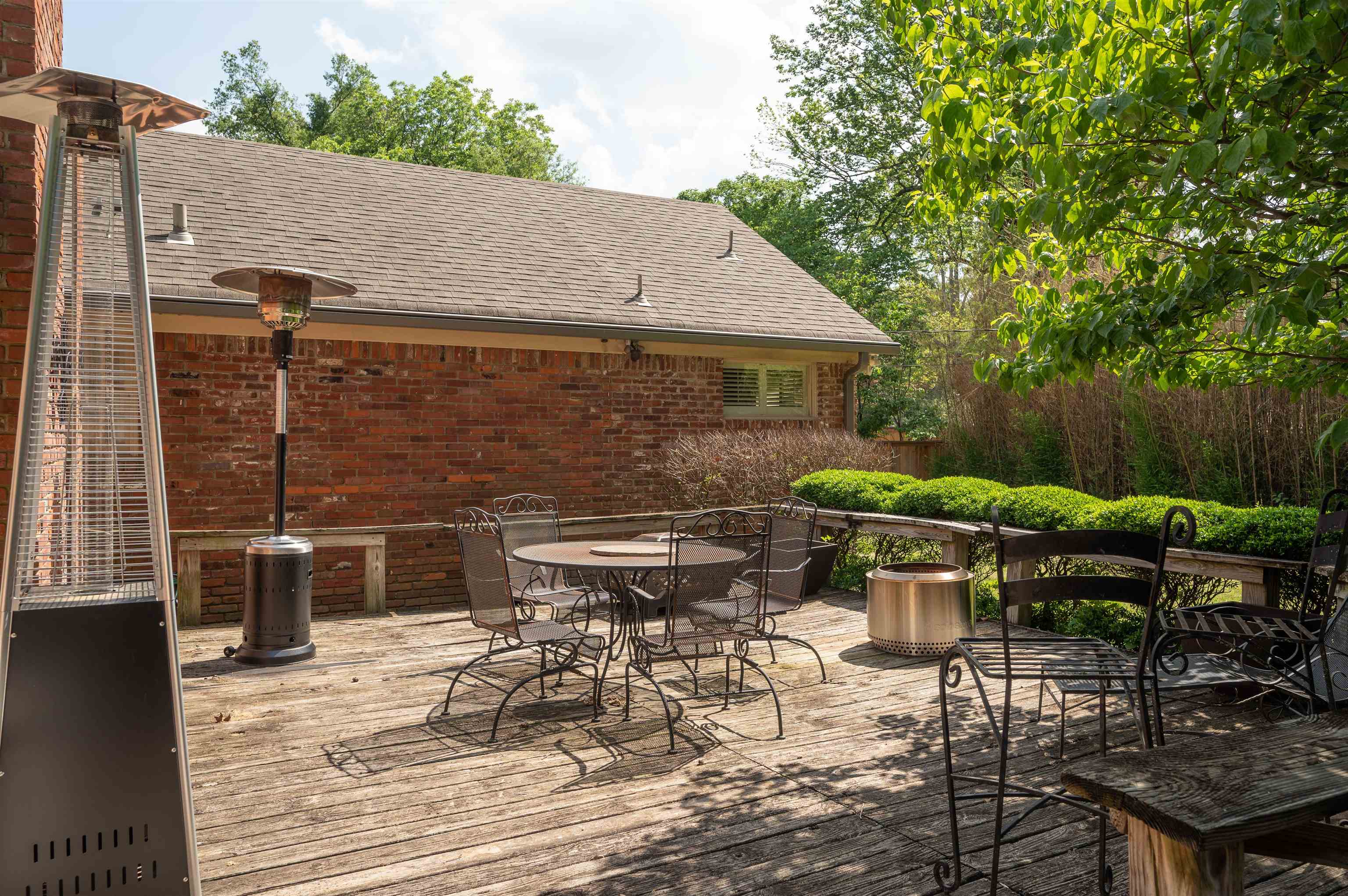 1187 Hayne Road Memphis, TN 38119 - Photo 22 of 25 a backyard of a house with outdoor seating