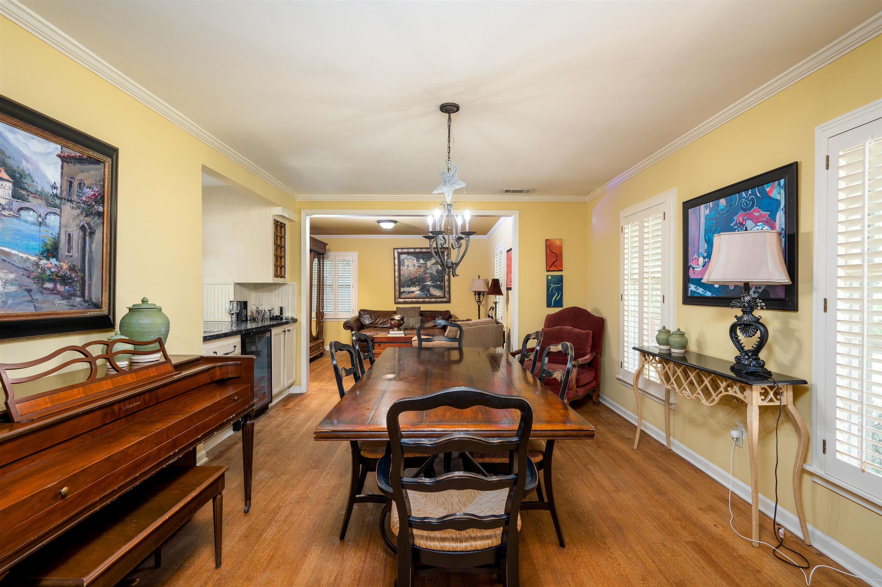 1187 Hayne Road Memphis, TN 38119 - Photo 7 of 25 a living room with furniture a rug and a flat screen tv