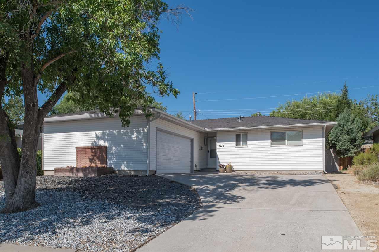 623 Beldon Way Reno, NV 89503 - Photo 1 of 1 a view of a white house with a yard and large tree