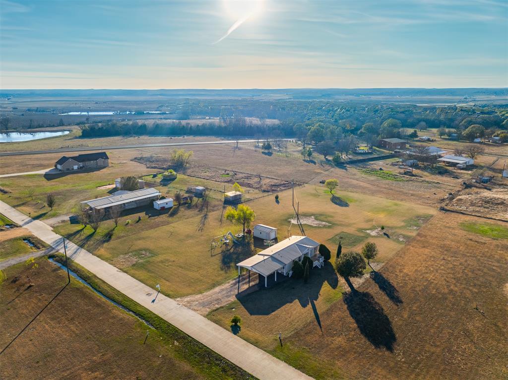 184 Private Road Sumner, TX 75486 - Photo 2 of 30 an aerial view of residential houses with outdoor space