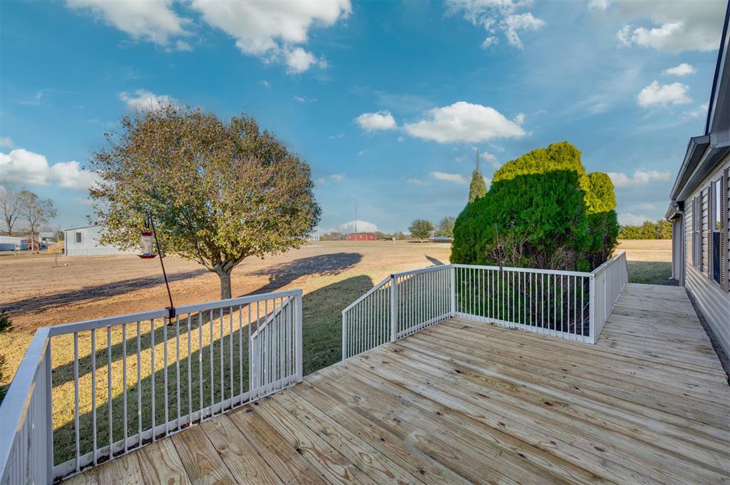 184 Private Road Sumner, TX 75486 - Photo 23 of 30 a balcony view with a garden