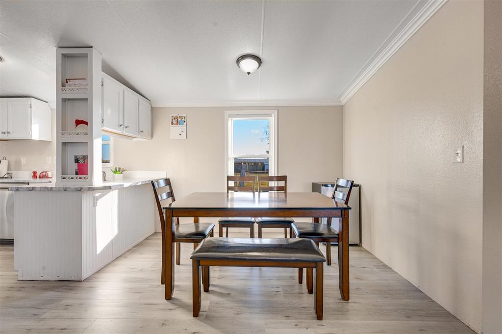 184 Private Road Sumner, TX 75486 - Photo 8 of 30 a view of a dining room with furniture