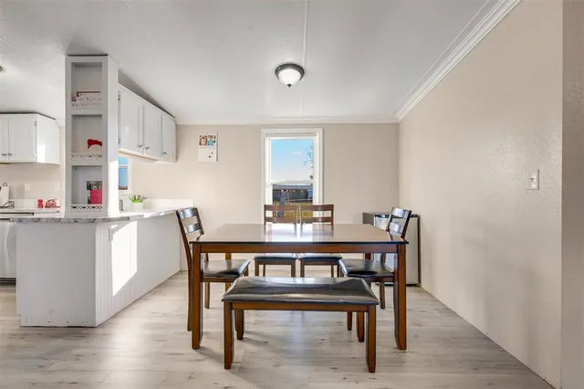 a view of a dining room with furniture