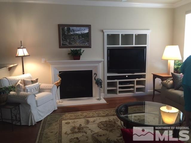 1365 Winterchase Way Reno, NV 89523 - Photo 6 of 25 a living room with furniture and a flat screen tv