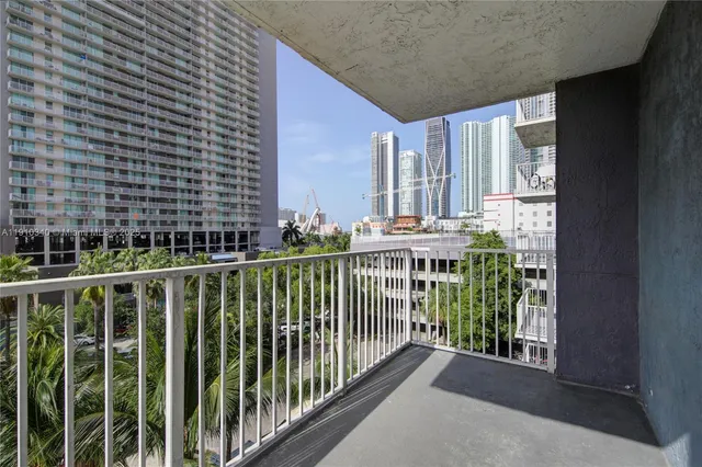 a view of balcony with furniture