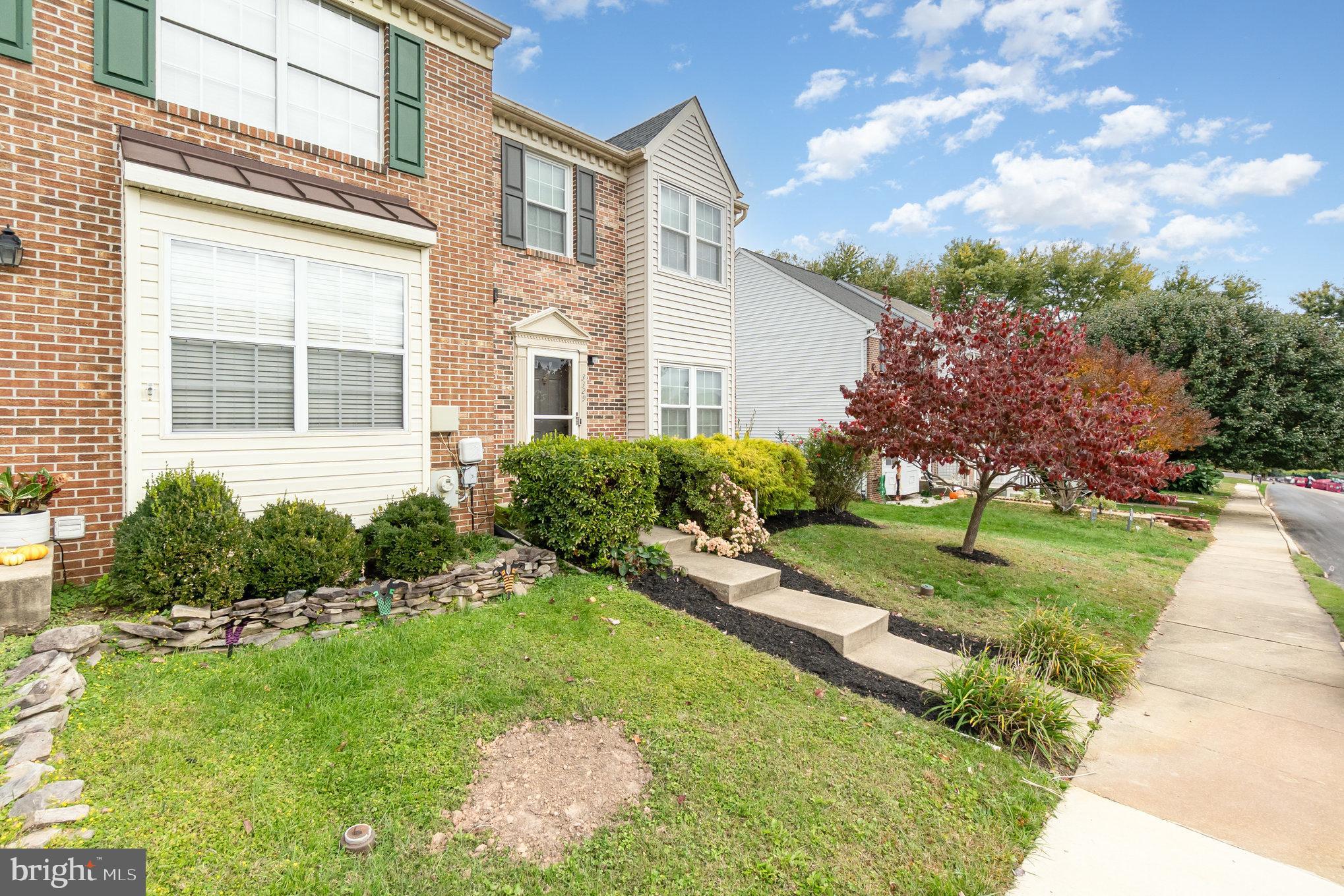 3329 Betterton Circle Abingdon, MD 21009 - Photo 2 of 38 a front view of a house with a yard