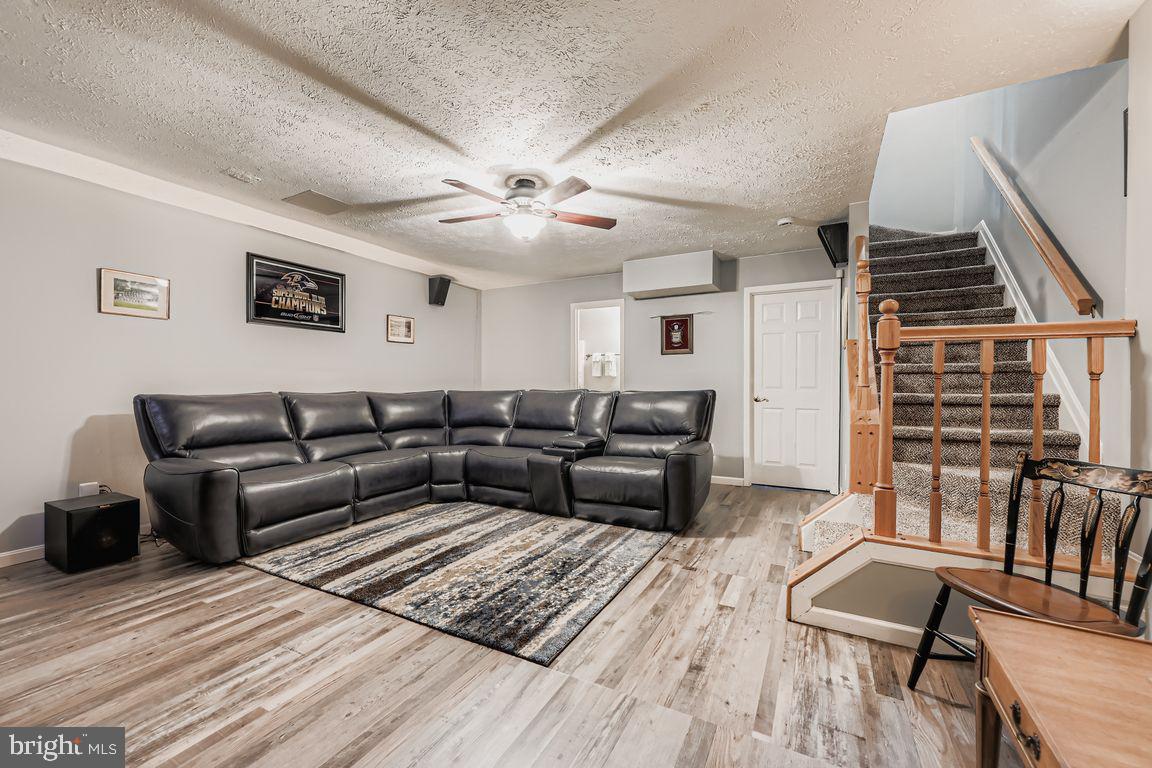 3329 Betterton Circle Abingdon, MD 21009 - Photo 24 of 38 a living room with furniture and a wooden floor