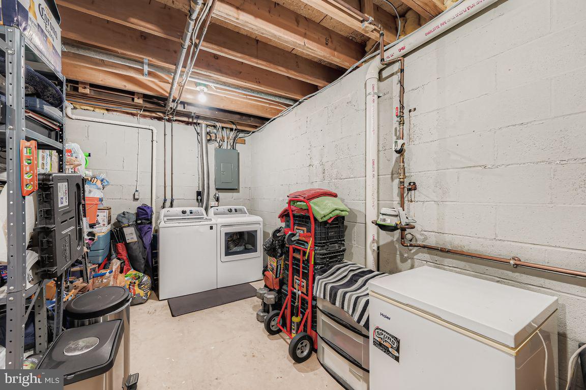 3329 Betterton Circle Abingdon, MD 21009 - Photo 26 of 38 a storage and utility room with lots of gym equipment