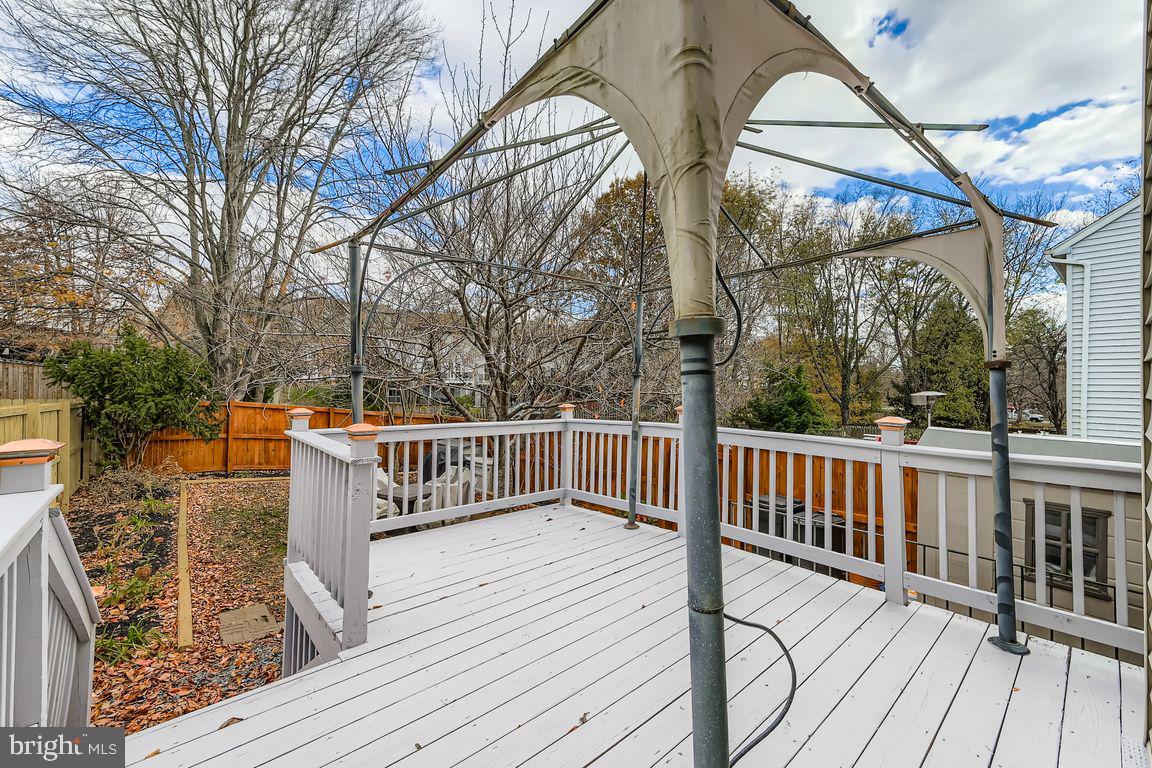 3329 Betterton Circle Abingdon, MD 21009 - Photo 27 of 38 a view of a wooden deck with trees