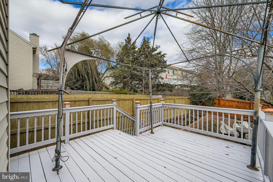 3329 Betterton Circle Abingdon, MD 21009 - Photo 28 of 38 a view of a balcony with wooden floor and fence