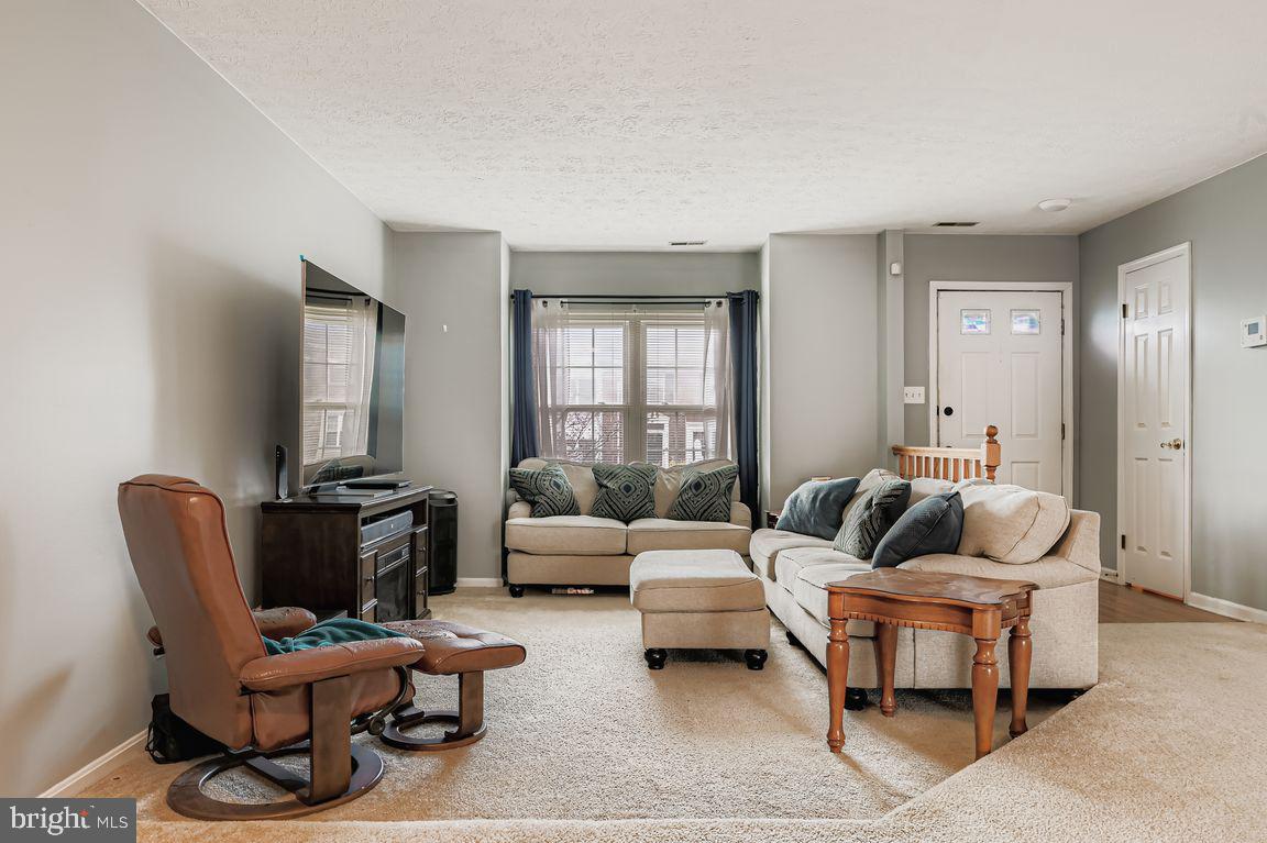 3329 Betterton Circle Abingdon, MD 21009 - Photo 6 of 38 a living room with furniture and a potted plant