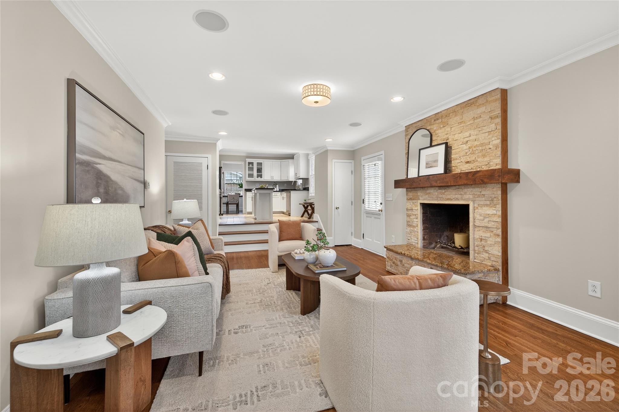 731 Sandridge Road Charlotte, NC 28210 - Photo 14 of 32 a living room with furniture and a fireplace