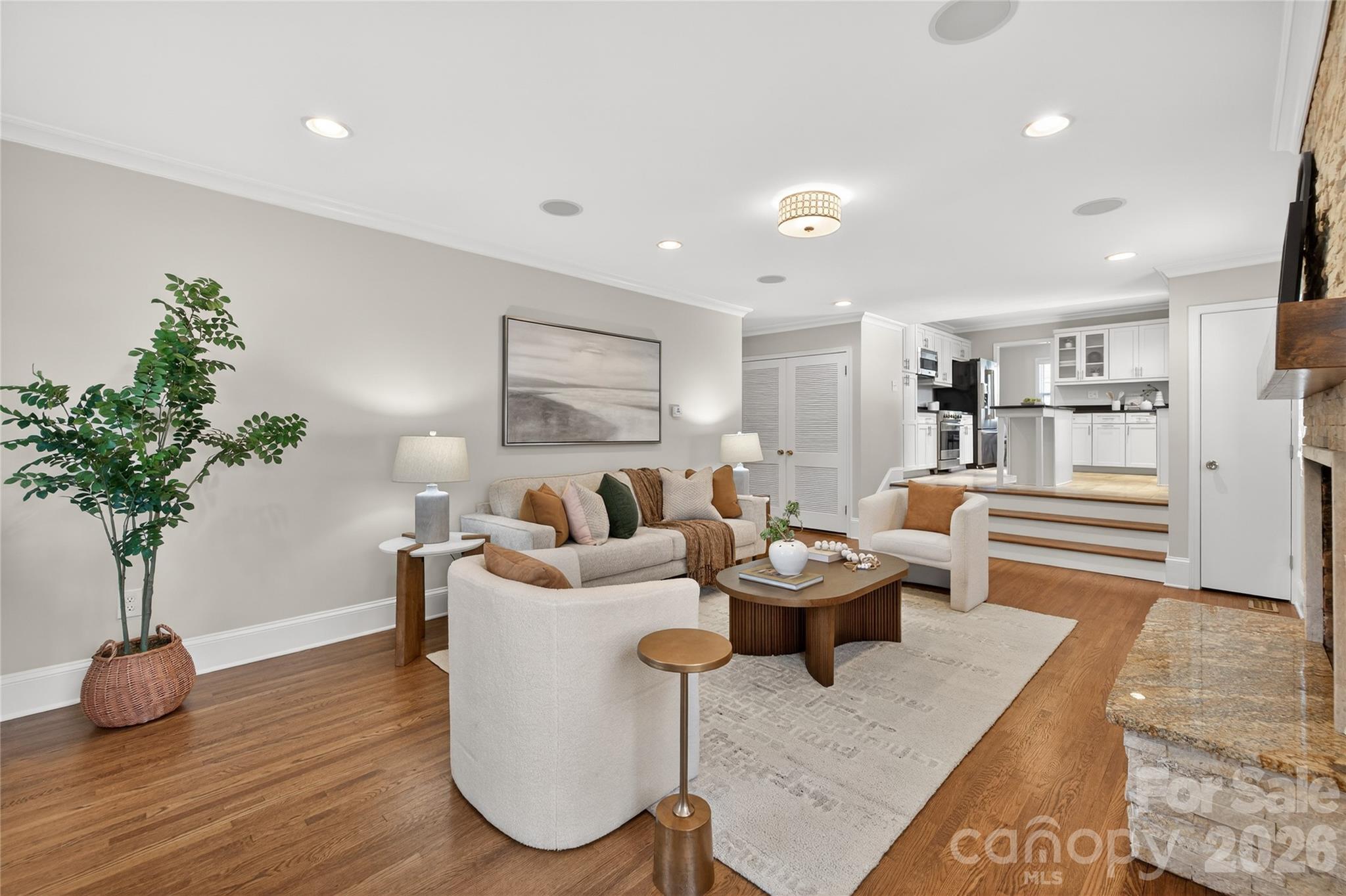 731 Sandridge Road Charlotte, NC 28210 - Photo 15 of 32 a living room with furniture potted plant and a lamp