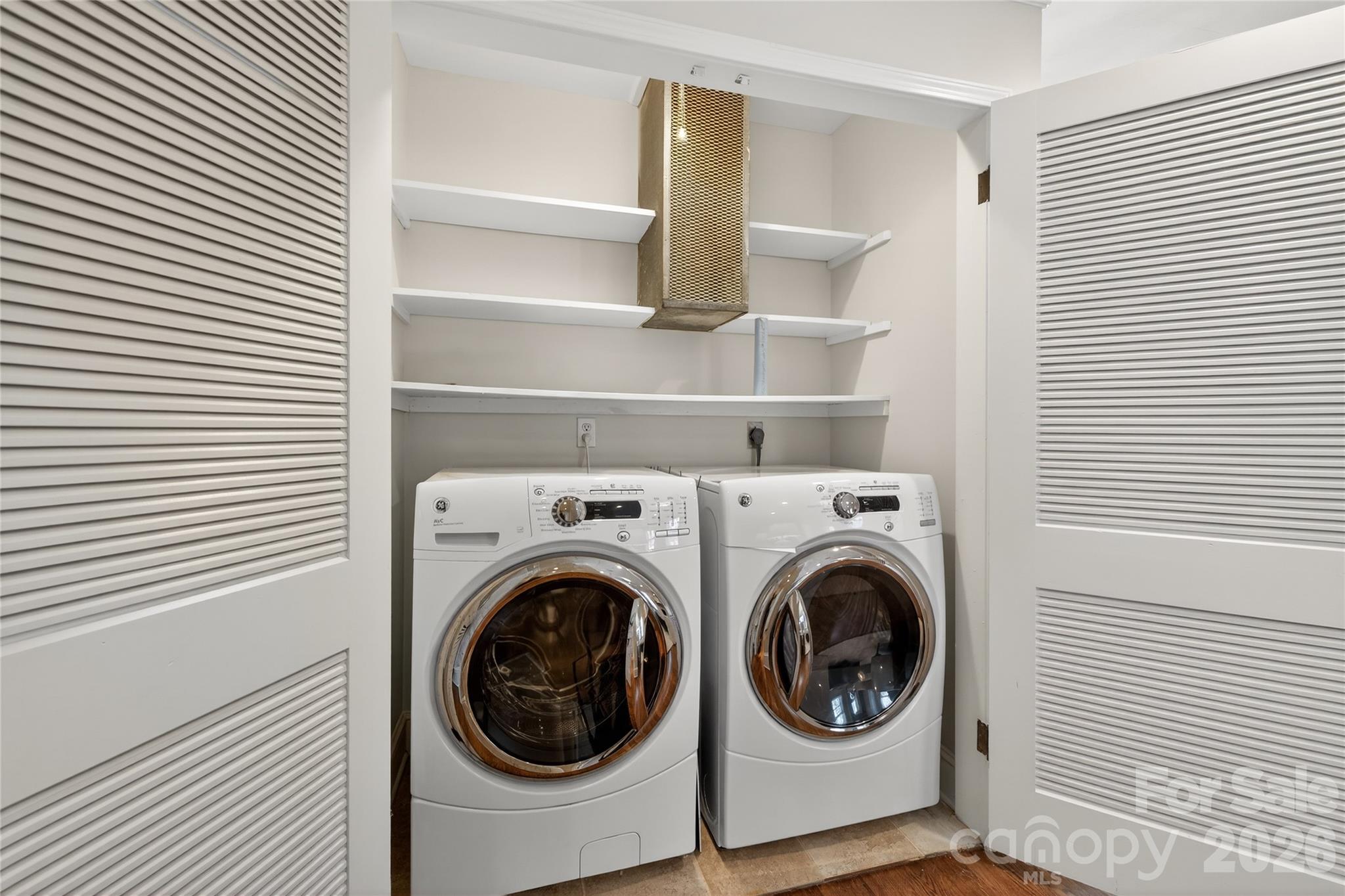 731 Sandridge Road Charlotte, NC 28210 - Photo 19 of 32 a utility room with dryer and washer