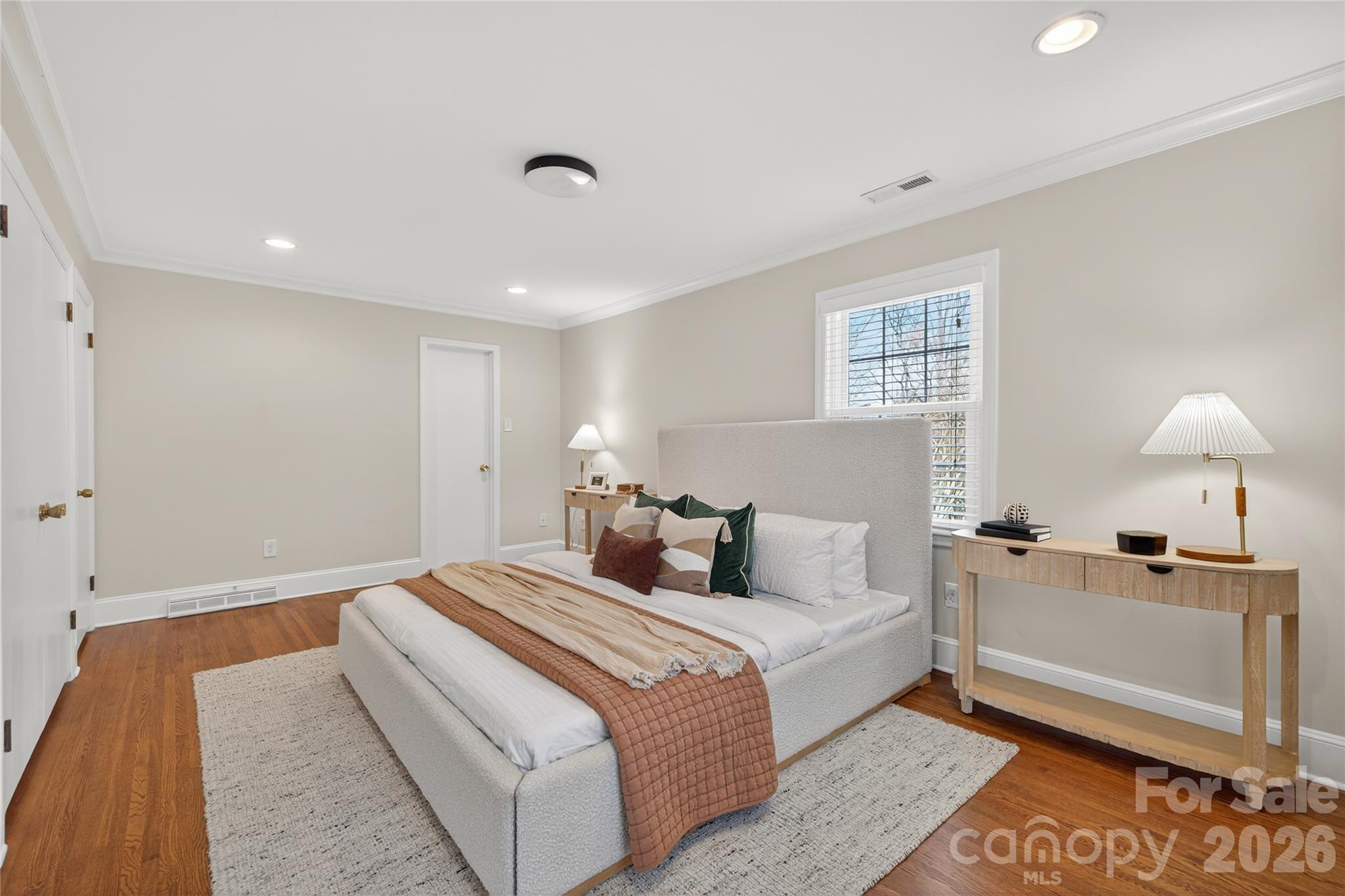 731 Sandridge Road Charlotte, NC 28210 - Photo 21 of 32 a bedroom with double bed and a window
