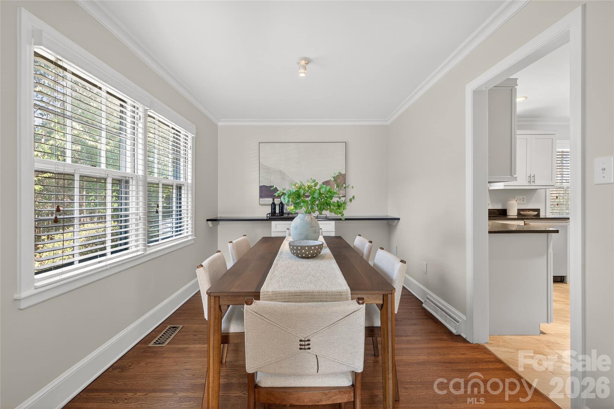 731 Sandridge Road Charlotte, NC 28210 - Photo 7 of 32 a view of a dining room with furniture window and wooden floor