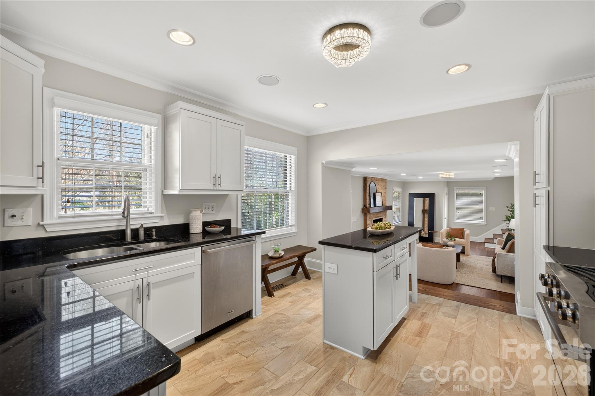 731 Sandridge Road Charlotte, NC 28210 - Photo 8 of 32 a kitchen with granite countertop a sink and cabinets