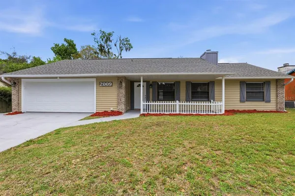 a view of house with front door