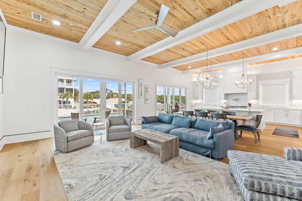 a bathroom with a granite countertop sink mirror vanity and toilet