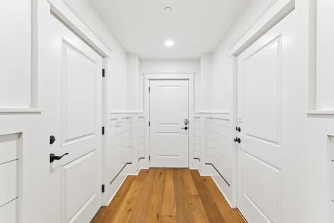 a view of a bathroom from a hallway