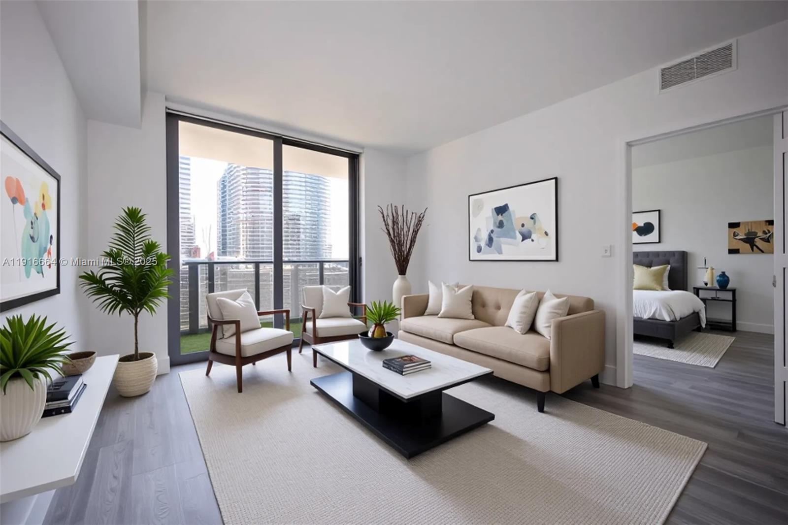 45 Southwest 9th Street, Unit 1504 Miami, FL 33130 - Photo 12 of 33 a living room with furniture and a large window