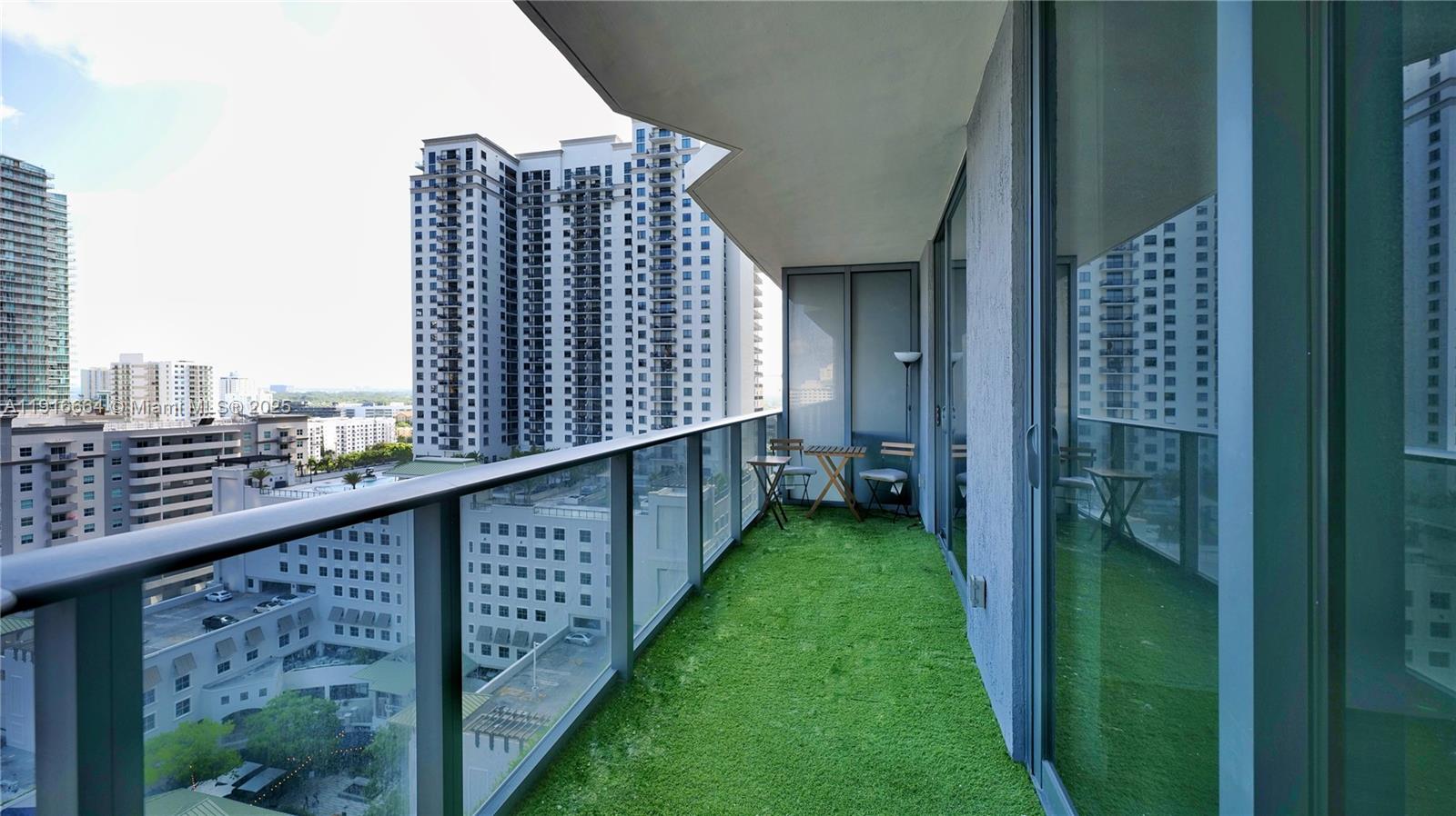 45 Southwest 9th Street, Unit 1504 Miami, FL 33130 - Photo 31 of 33 a view of a balcony with an outdoor space