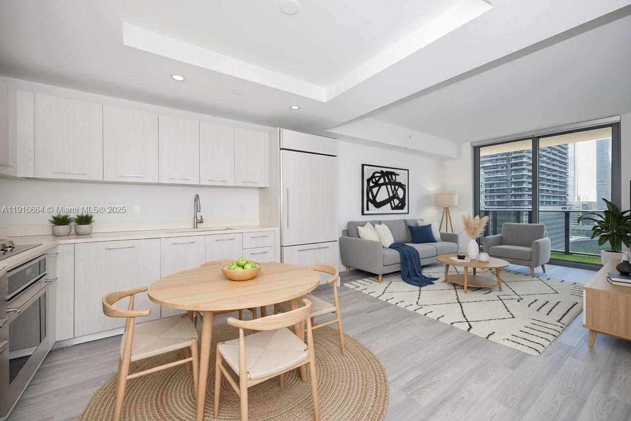 45 Southwest 9th Street, Unit 1504 Miami, FL 33130 - Photo 8 of 33 a view of a dining room with furniture window and outside view