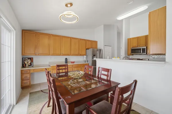a view of a dining room with furniture