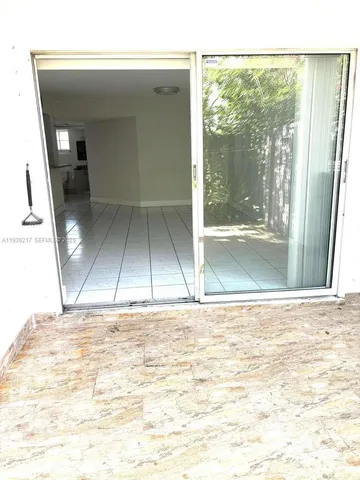 an empty room with white door