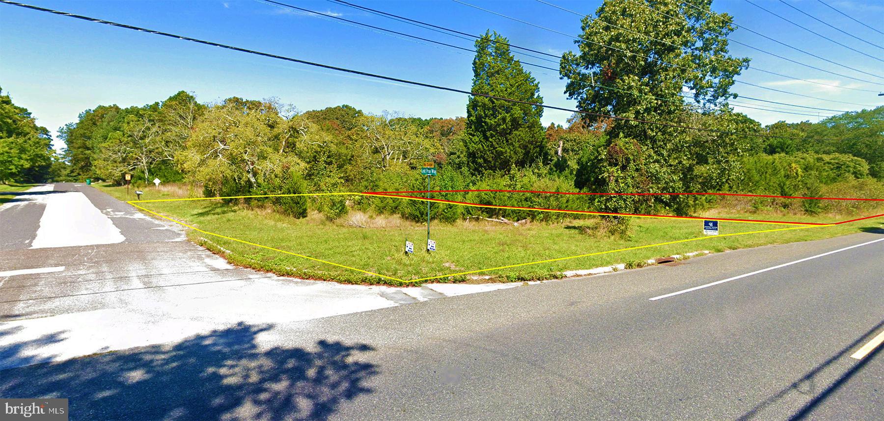 629 East Lost Pine Way Road Absecon, NJ 08205 - Photo 3 of 4 a view of a swimming pool with a yard