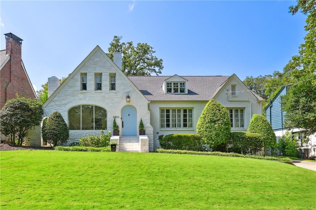 2800 Atwood Road Northeast Atlanta, GA 30305 - Photo 1 of 1 a front view of a house with a yard