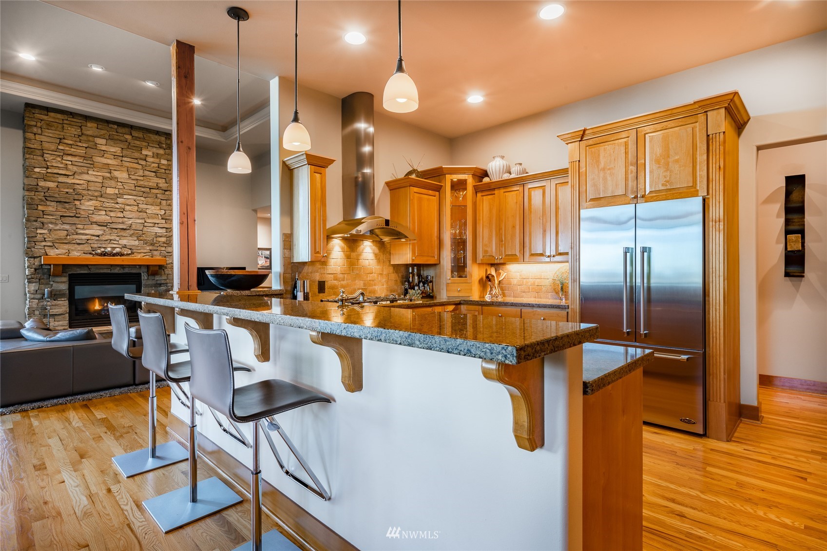 5416 Canvasback Road Blaine, WA 98230 - Photo 5 of 12 a kitchen with stainless steel appliances granite countertop a refrigerator a stove and a sink