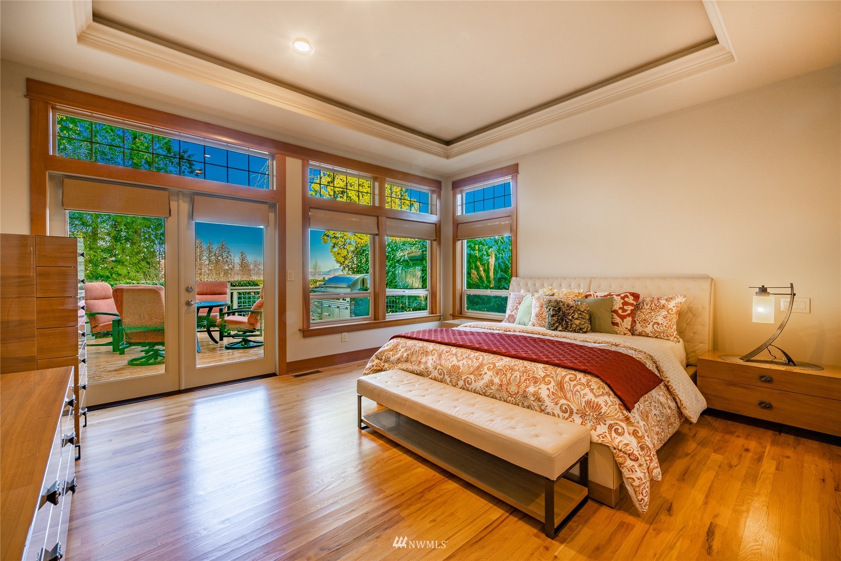 5416 Canvasback Road Blaine, WA 98230 - Photo 6 of 12 a bed sitting in a spacious bedroom next to a large window