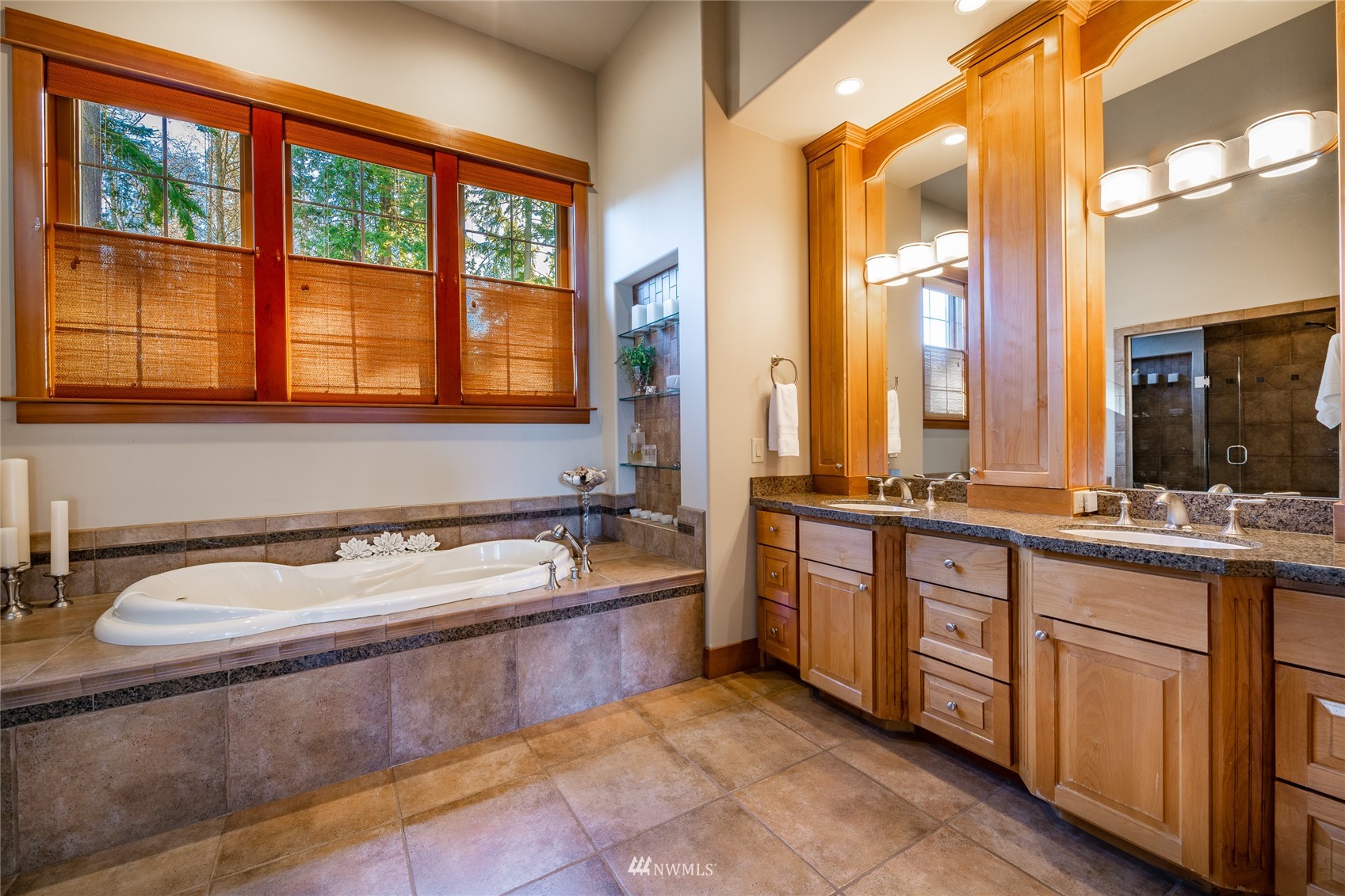 5416 Canvasback Road Blaine, WA 98230 - Photo 7 of 12 a bathroom with a tub sink and mirror