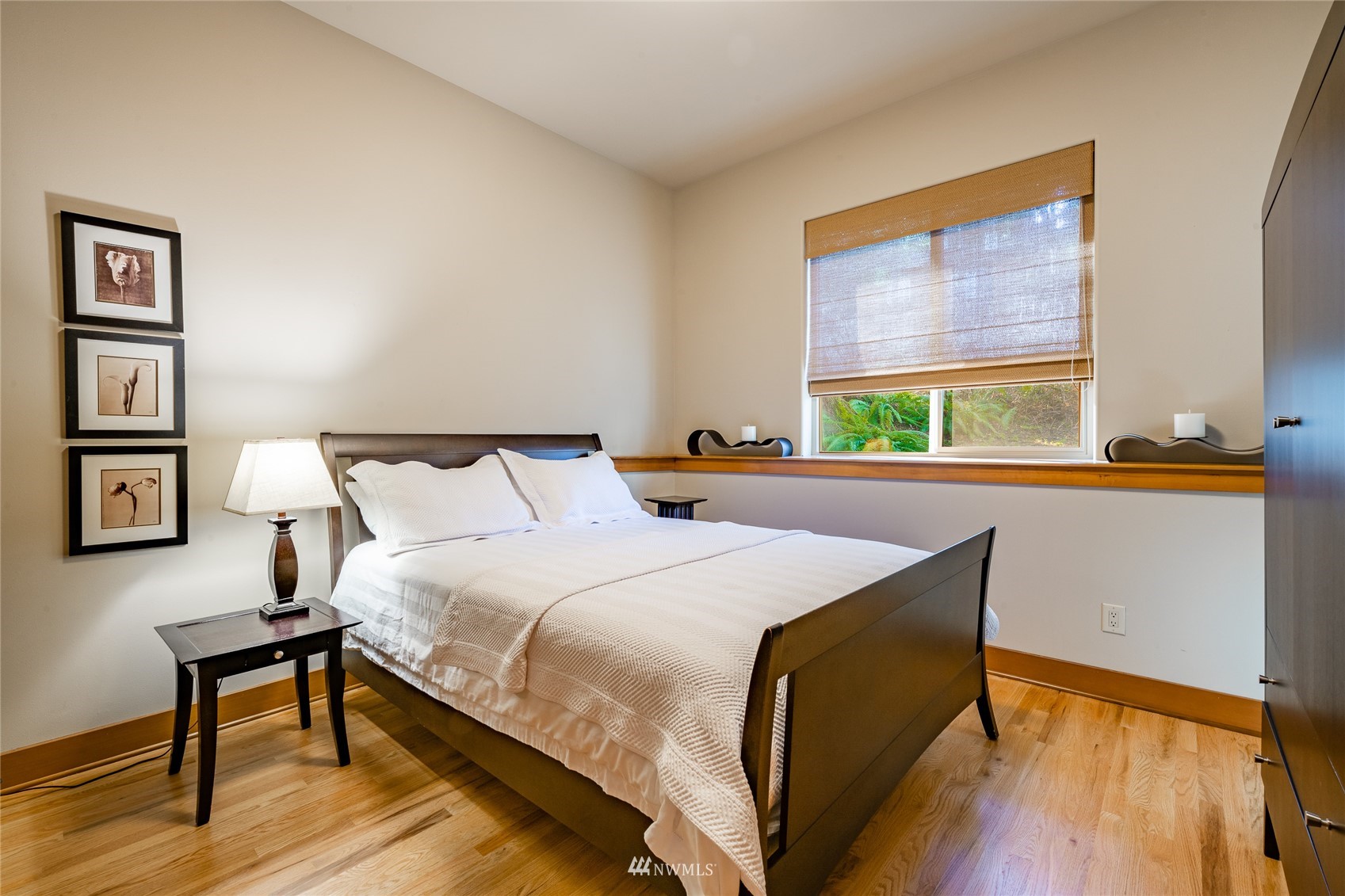 5416 Canvasback Road Blaine, WA 98230 - Photo 8 of 12 a bedroom with a bed and a window